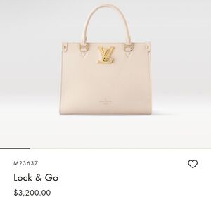 Cream Louis Vuitton lock and key purse